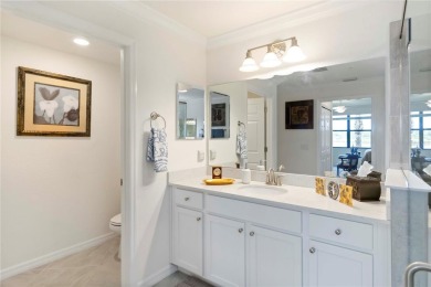 Stunning Ground-Floor Condo with Water Views in Sarasota on Sarasota National Golf Club in Florida - for sale on GolfHomes.com, golf home, golf lot