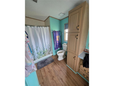 Welcome to this well-kept 2-bedroom, 2-bath home in the popular on Brookridge Country Club in Florida - for sale on GolfHomes.com, golf home, golf lot