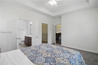 This beautifully maintained 3-bed, 2-bath home with a heated on Hilton Head Lakes Golf Club in South Carolina - for sale on GolfHomes.com, golf home, golf lot