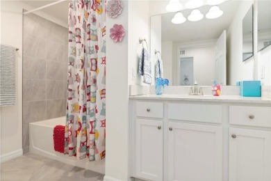 Stunning Ground-Floor Condo with Water Views in Sarasota on Sarasota National Golf Club in Florida - for sale on GolfHomes.com, golf home, golf lot