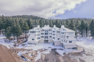 Your Mountain Condo Retreat with Garage Awaits! Step into this on Angel Fire Resort Country Club in New Mexico - for sale on GolfHomes.com, golf home, golf lot