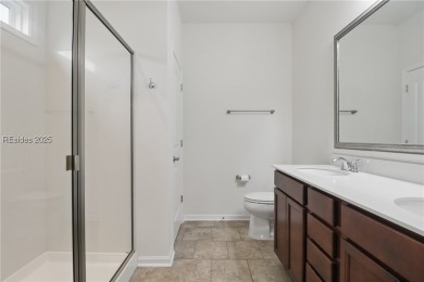 This beautifully maintained 3-bed, 2-bath home with a heated on Hilton Head Lakes Golf Club in South Carolina - for sale on GolfHomes.com, golf home, golf lot