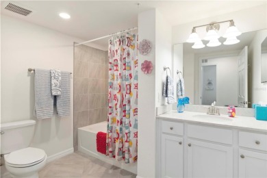 Stunning Ground-Floor Condo with Water Views in Sarasota on Sarasota National Golf Club in Florida - for sale on GolfHomes.com, golf home, golf lot