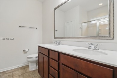 This beautifully maintained 3-bed, 2-bath home with a heated on Hilton Head Lakes Golf Club in South Carolina - for sale on GolfHomes.com, golf home, golf lot