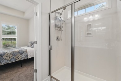 This beautifully maintained 3-bed, 2-bath home with a heated on Hilton Head Lakes Golf Club in South Carolina - for sale on GolfHomes.com, golf home, golf lot