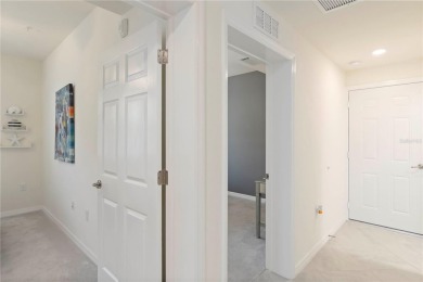 Stunning Ground-Floor Condo with Water Views in Sarasota on Sarasota National Golf Club in Florida - for sale on GolfHomes.com, golf home, golf lot