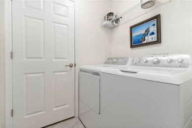 Stunning Ground-Floor Condo with Water Views in Sarasota on Sarasota National Golf Club in Florida - for sale on GolfHomes.com, golf home, golf lot