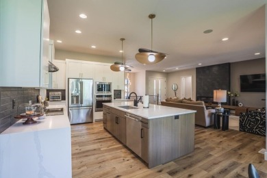 Recently built in 2023, this custom ranch home offers 5 bedrooms on Dakota Dunes Country Club in South Dakota - for sale on GolfHomes.com, golf home, golf lot