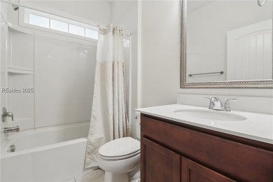 This beautifully maintained 3-bed, 2-bath home with a heated on Hilton Head Lakes Golf Club in South Carolina - for sale on GolfHomes.com, golf home, golf lot