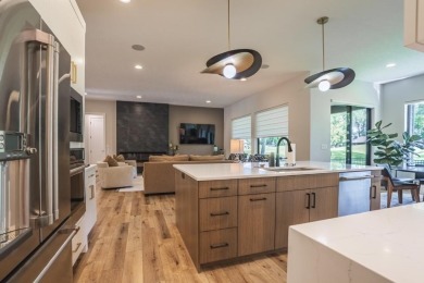Recently built in 2023, this custom ranch home offers 5 bedrooms on Dakota Dunes Country Club in South Dakota - for sale on GolfHomes.com, golf home, golf lot