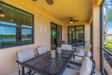 Stunning Ground-Floor Condo with Water Views in Sarasota on Sarasota National Golf Club in Florida - for sale on GolfHomes.com, golf home, golf lot