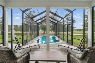 This beautifully maintained 3-bed, 2-bath home with a heated on Hilton Head Lakes Golf Club in South Carolina - for sale on GolfHomes.com, golf home, golf lot