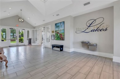 This beautifully maintained 3-bed, 2-bath home with a heated on Hilton Head Lakes Golf Club in South Carolina - for sale on GolfHomes.com, golf home, golf lot
