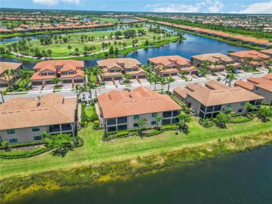 Stunning Ground-Floor Condo with Water Views in Sarasota on Sarasota National Golf Club in Florida - for sale on GolfHomes.com, golf home, golf lot