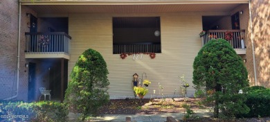 Move into this beautifully maintained lower level 2 bedroom 2 on Pine Brook Golf Course in New Jersey - for sale on GolfHomes.com, golf home, golf lot