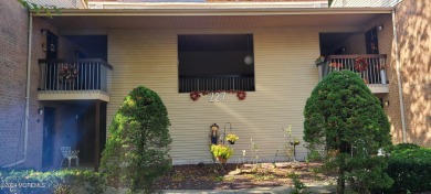 Move into this beautifully maintained lower level 2 bedroom 2 on Pine Brook Golf Course in New Jersey - for sale on GolfHomes.com, golf home, golf lot