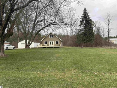 Very nicely updated story and a half home overlooking the Pine on Pine River Golf Club in Michigan - for sale on GolfHomes.com, golf home, golf lot