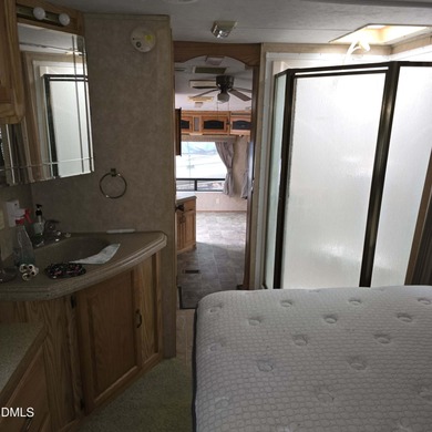 Beautiful camping lot located in the gated Lake Royale on River Golf and Country Club at Lake Royale in North Carolina - for sale on GolfHomes.com, golf home, golf lot