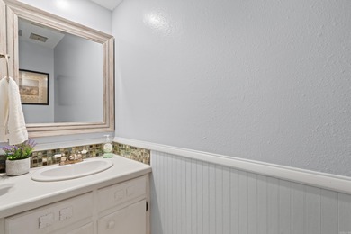 Perfectly Move-In Ready! Step into Spanish-style charm in this on DeSoto Golf Course in Arkansas - for sale on GolfHomes.com, golf home, golf lot