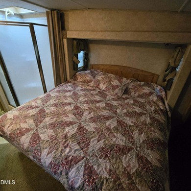 Beautiful camping lot located in the gated Lake Royale on River Golf and Country Club at Lake Royale in North Carolina - for sale on GolfHomes.com, golf home, golf lot