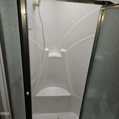 Beautiful camping lot located in the gated Lake Royale on River Golf and Country Club at Lake Royale in North Carolina - for sale on GolfHomes.com, golf home, golf lot