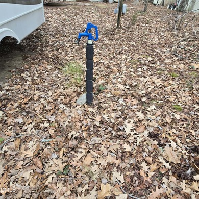 Beautiful camping lot located in the gated Lake Royale on River Golf and Country Club at Lake Royale in North Carolina - for sale on GolfHomes.com, golf home, golf lot