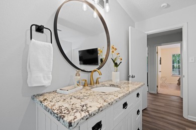 Perfectly Move-In Ready! Step into Spanish-style charm in this on DeSoto Golf Course in Arkansas - for sale on GolfHomes.com, golf home, golf lot