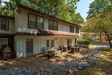 Perfectly Move-In Ready! Step into Spanish-style charm in this on DeSoto Golf Course in Arkansas - for sale on GolfHomes.com, golf home, golf lot