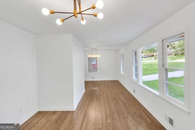 This charming 3-bedroom, 2-bath, 4-sided brick ranch in on Browns Mill Golf Course in Georgia - for sale on GolfHomes.com, golf home, golf lot