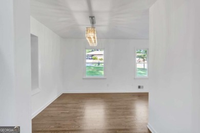 This charming 3-bedroom, 2-bath, 4-sided brick ranch in on Browns Mill Golf Course in Georgia - for sale on GolfHomes.com, golf home, golf lot