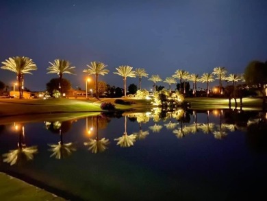 The home is located in the Guard Gated Lake community of Laguna on La Quinta Golf  Resort and Country Clubs in California - for sale on GolfHomes.com, golf home, golf lot