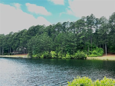 Breathtaking waterfront property within the exclusive Pinewild on Pinewild Country Club of Pinehurst in North Carolina - for sale on GolfHomes.com, golf home, golf lot