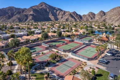 The home is located in the Guard Gated Lake community of Laguna on La Quinta Golf  Resort and Country Clubs in California - for sale on GolfHomes.com, golf home, golf lot