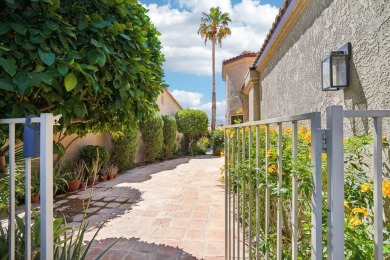 The home is located in the Guard Gated Lake community of Laguna on La Quinta Golf  Resort and Country Clubs in California - for sale on GolfHomes.com, golf home, golf lot