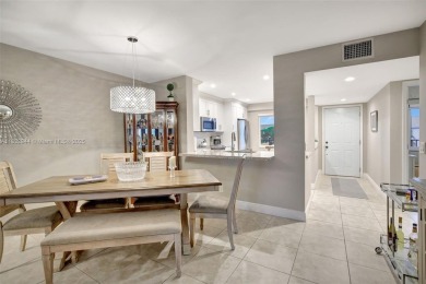 Impeccably upgraded fourth-floor unit featuring two bedrooms and on Flamingo Lakes Country Club in Florida - for sale on GolfHomes.com, golf home, golf lot