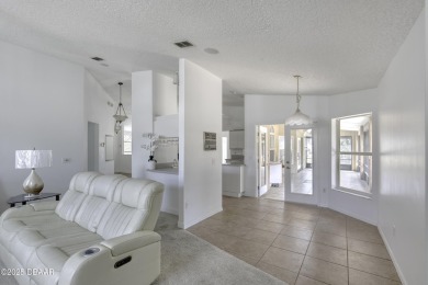Come view this rarely available 4 bedroom, 2.5-bathroom ranch on Spruce Creek Golf Club in Florida - for sale on GolfHomes.com, golf home, golf lot