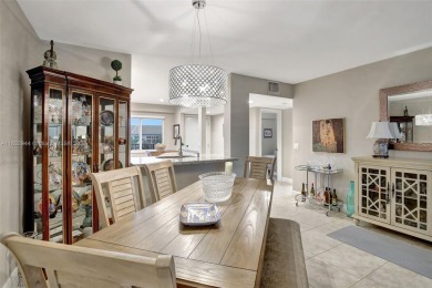 Impeccably upgraded fourth-floor unit featuring two bedrooms and on Flamingo Lakes Country Club in Florida - for sale on GolfHomes.com, golf home, golf lot