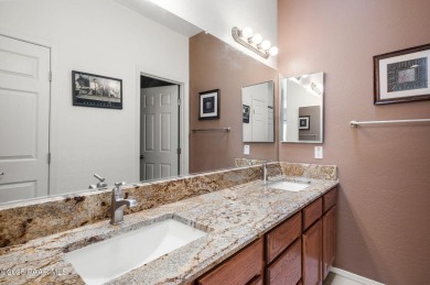 This charming 2 bedroom townhome has beautiful views of the on Prescott Golf and Country Club in Arizona - for sale on GolfHomes.com, golf home, golf lot