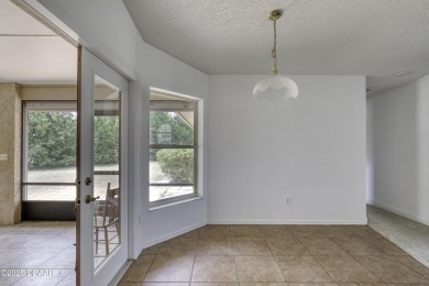Come view this rarely available 4 bedroom, 2.5-bathroom ranch on Spruce Creek Golf Club in Florida - for sale on GolfHomes.com, golf home, golf lot