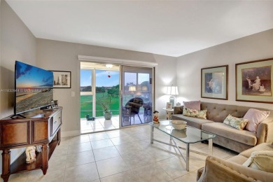 Impeccably upgraded fourth-floor unit featuring two bedrooms and on Flamingo Lakes Country Club in Florida - for sale on GolfHomes.com, golf home, golf lot