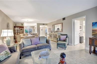 Impeccably upgraded fourth-floor unit featuring two bedrooms and on Flamingo Lakes Country Club in Florida - for sale on GolfHomes.com, golf home, golf lot