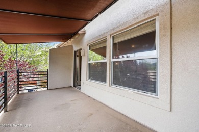 This charming 2 bedroom townhome has beautiful views of the on Prescott Golf and Country Club in Arizona - for sale on GolfHomes.com, golf home, golf lot