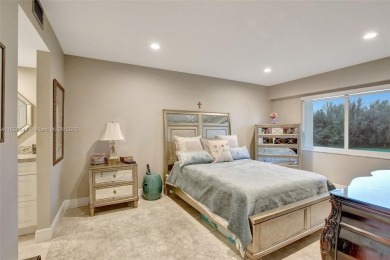 Impeccably upgraded fourth-floor unit featuring two bedrooms and on Flamingo Lakes Country Club in Florida - for sale on GolfHomes.com, golf home, golf lot