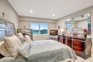 Impeccably upgraded fourth-floor unit featuring two bedrooms and on Flamingo Lakes Country Club in Florida - for sale on GolfHomes.com, golf home, golf lot