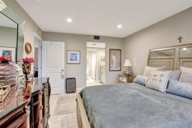 Impeccably upgraded fourth-floor unit featuring two bedrooms and on Flamingo Lakes Country Club in Florida - for sale on GolfHomes.com, golf home, golf lot