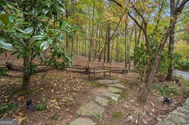 Enjoy resort style living in this meticulously maintained five on Big Canoe Golf Club - Cherokee in Georgia - for sale on GolfHomes.com, golf home, golf lot