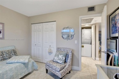 Impeccably upgraded fourth-floor unit featuring two bedrooms and on Flamingo Lakes Country Club in Florida - for sale on GolfHomes.com, golf home, golf lot