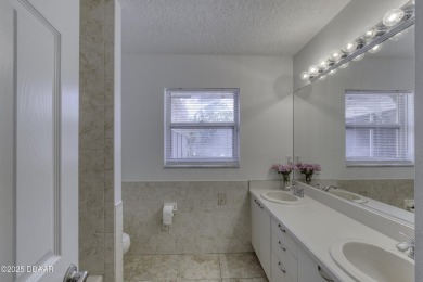Come view this rarely available 4 bedroom, 2.5-bathroom ranch on Spruce Creek Golf Club in Florida - for sale on GolfHomes.com, golf home, golf lot