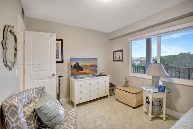 Impeccably upgraded fourth-floor unit featuring two bedrooms and on Flamingo Lakes Country Club in Florida - for sale on GolfHomes.com, golf home, golf lot