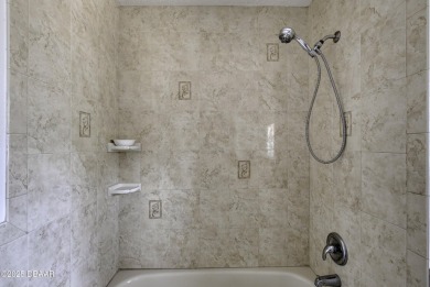 Come view this rarely available 4 bedroom, 2.5-bathroom ranch on Spruce Creek Golf Club in Florida - for sale on GolfHomes.com, golf home, golf lot